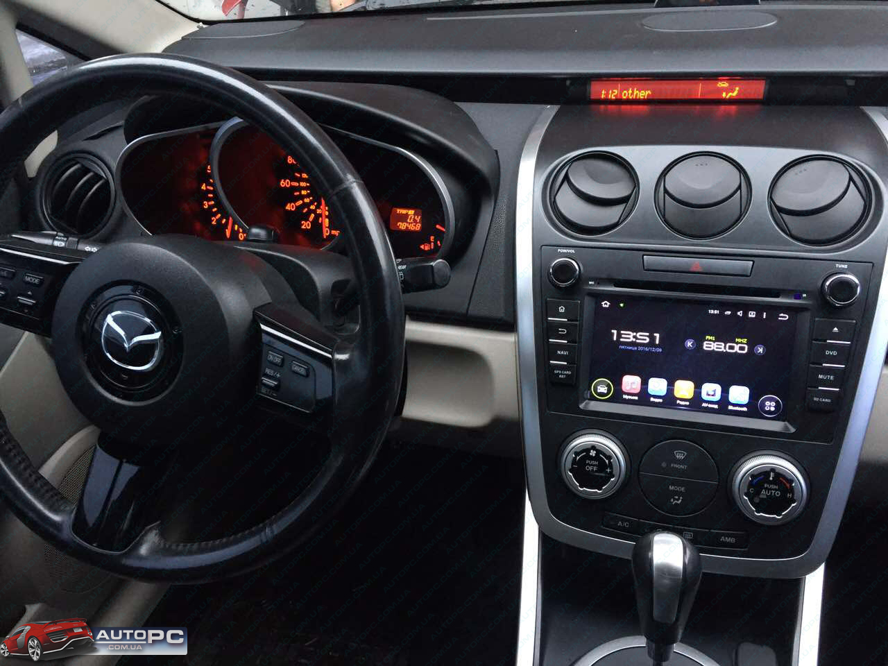 Штатная магнитола на Mazda CX7